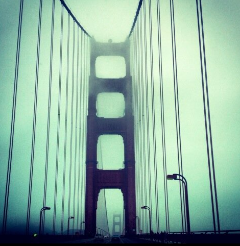 The Golden Gate Bridge covered in mist