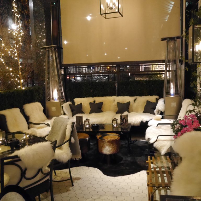 The terrace has been decked out as a comfortable Winter Garden