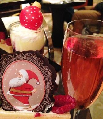 The raspberry tart is festively decorated and can be enjoyed with a glass of pink champagne 