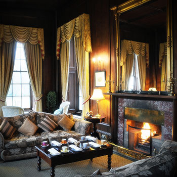 Guests can snuggle up by the fire in the lounge